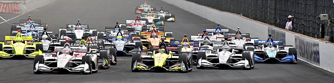 indy cars racing to through the start line Albuquerque