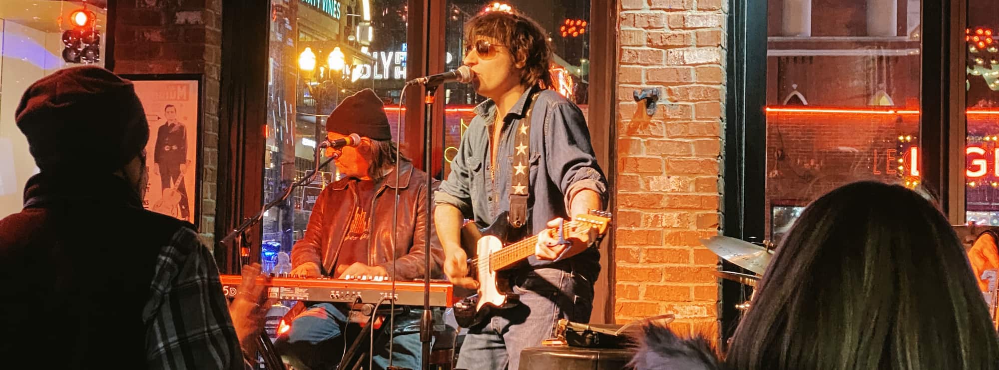 bar singer on guitar in Albuquerque